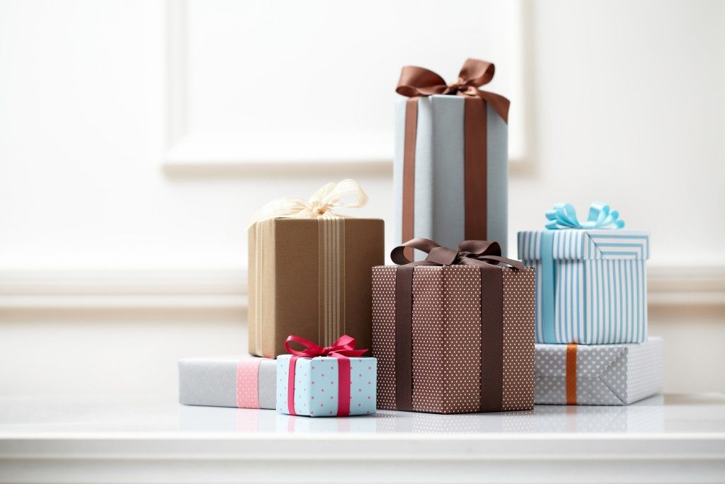 Gift boxes with colorful wrapping paper and ribbons