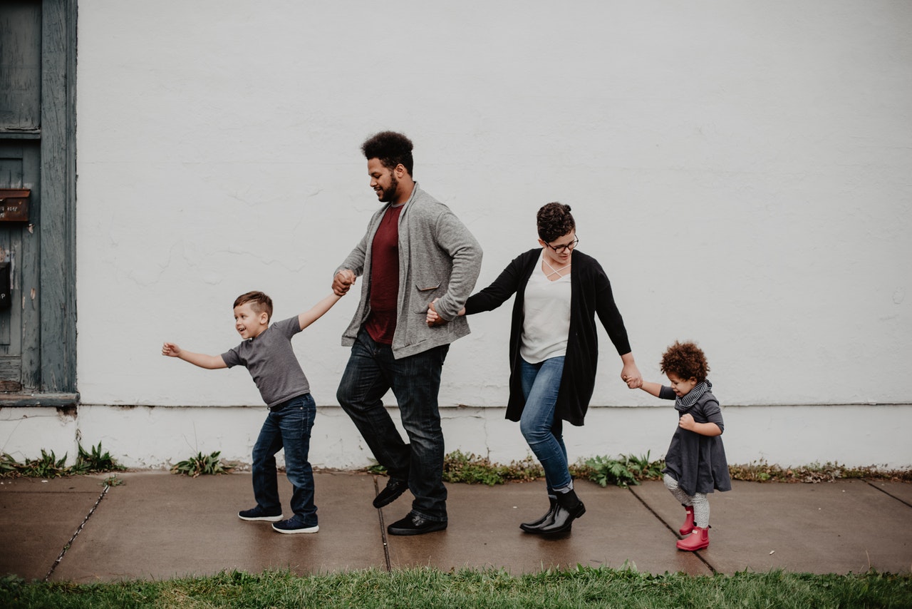 parents playing with their children