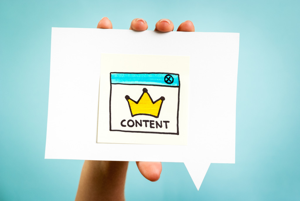 content marketing is king online concept drawing on a piece of paper