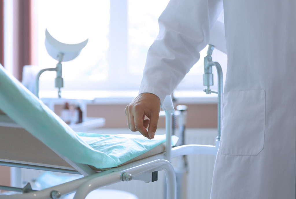 closeup of a doctor and clinic furniture on the side