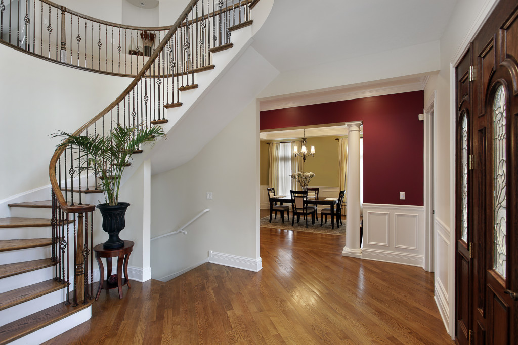 luxury home with curved staircase